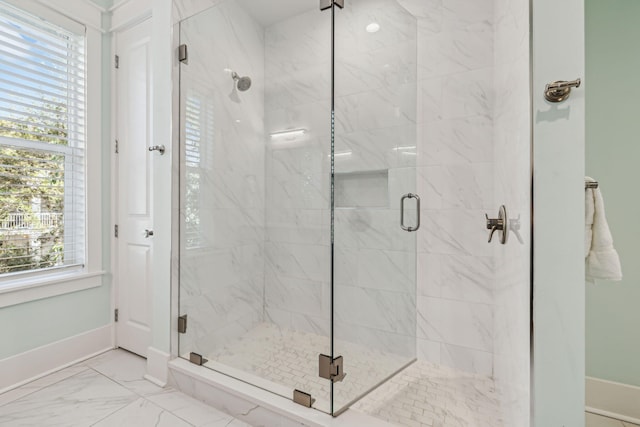 60 Barefoot Ln, Inlet Beach, FL 32461 - full bath with plenty of natural light, a stall shower, marble look tiles, and baseboards