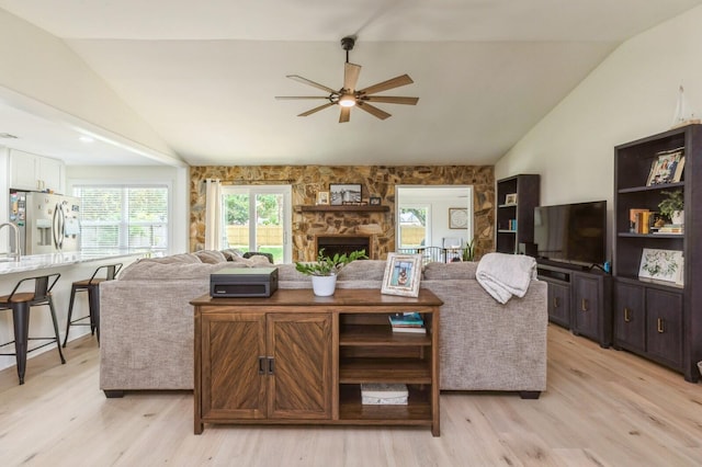 1148 Pin Oak Cir, Niceville, FL 32578 - living room with vaulted ceiling, ceiling fan, healthy amount of natural light, and light wood-style floors