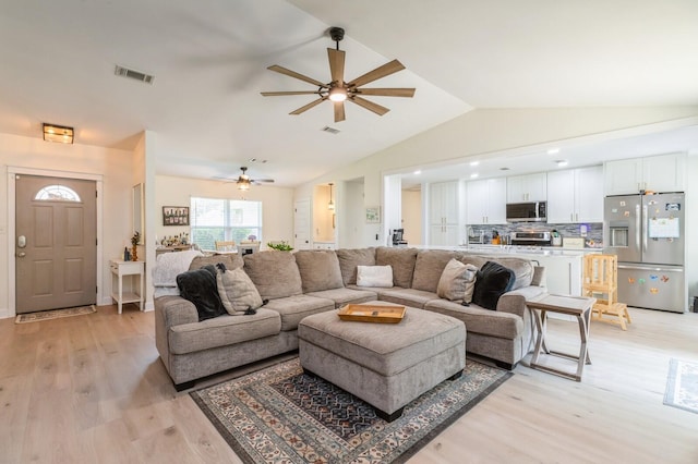 1148 Pin Oak Cir, Niceville, FL 32578 - living room featuring a ceiling fan, lofted ceiling, and light wood-style floors
