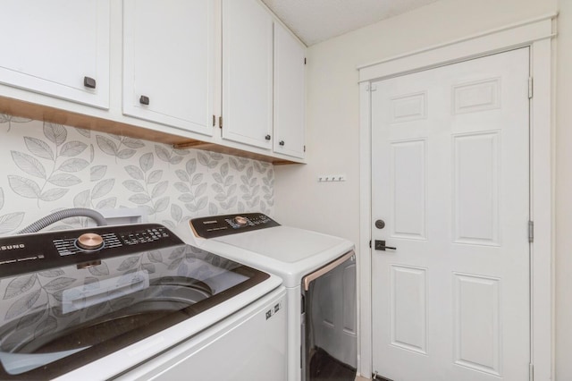 1148 Pin Oak Cir, Niceville, FL 32578 - laundry area with washer and clothes dryer and cabinet space