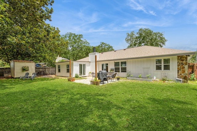 1148 Pin Oak Cir, Niceville, FL 32578 - back of house featuring a patio area and roof with shingles