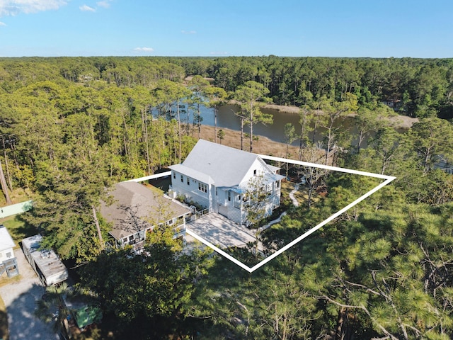 241 N 7th St, Santa Rosa Beach, FL 32459 - aerial view of property and surrounding area featuring a heavily wooded area, a large body of water, and property boundaries highlighted