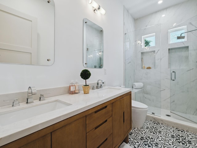 241 N 7th St, Santa Rosa Beach, FL 32459 - bathroom with a marble finish shower, double vanity, and toilet
