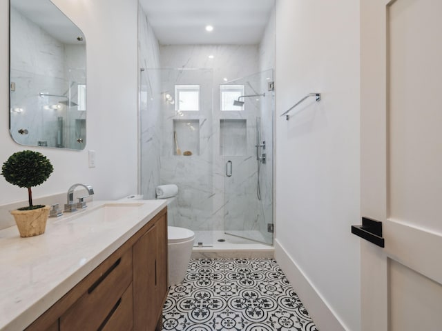 241 N 7th St, Santa Rosa Beach, FL 32459 - bathroom featuring vanity, a marble finish shower, toilet, and tile patterned floors