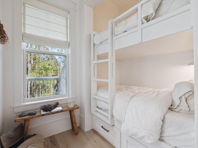 241 N 7th St, Santa Rosa Beach, FL 32459 - bedroom with light wood-type flooring