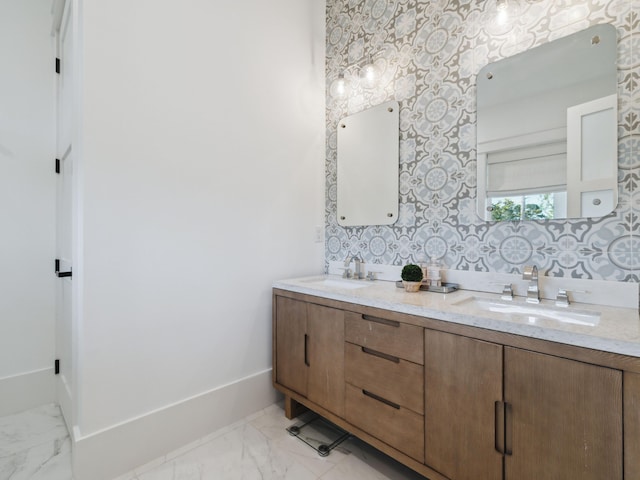 241 N 7th St, Santa Rosa Beach, FL 32459 - full bathroom with marble finish floors, double vanity, baseboards, and wallpapered walls