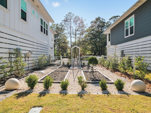 241 N 7th St, Santa Rosa Beach, FL 32459 - view of yard with a vegetable garden