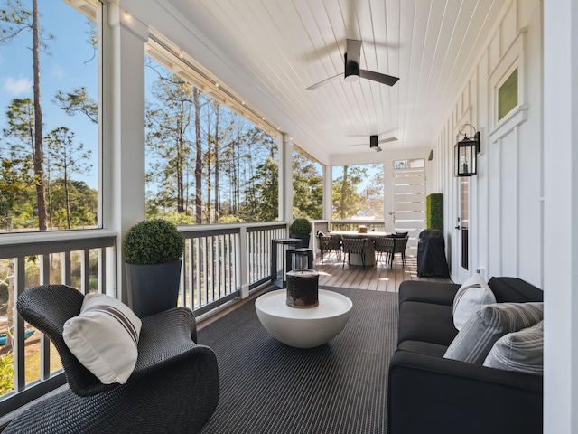 241 N 7th St, Santa Rosa Beach, FL 32459 - wooden deck featuring ceiling fan and outdoor dining space