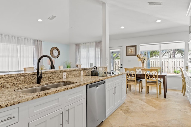 276 Sandy Cay Dr, Miramar Beach, FL 32550 - kitchen with dishwasher, a sink, white cabinets, light stone countertops, and black electric cooktop