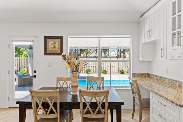 276 Sandy Cay Dr, Miramar Beach, FL 32550 - dining area with light tile patterned flooring and baseboards