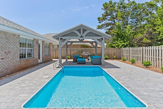 276 Sandy Cay Dr, Miramar Beach, FL 32550 - view of swimming pool featuring a gazebo, a patio, a fenced backyard, and outdoor lounge area