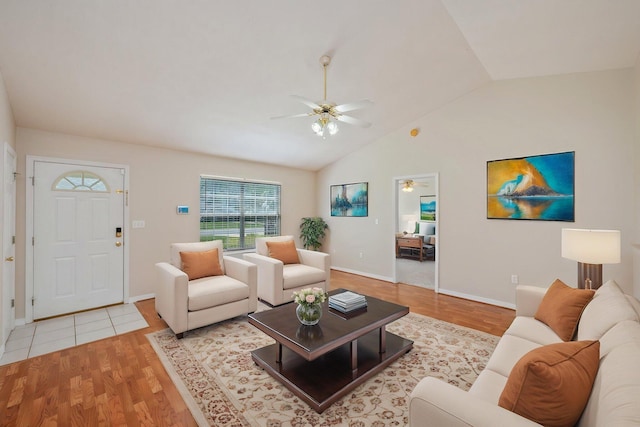 390 Brackin St, Crestview, FL 32539 - living room featuring a ceiling fan, light wood finished floors, lofted ceiling, and baseboards