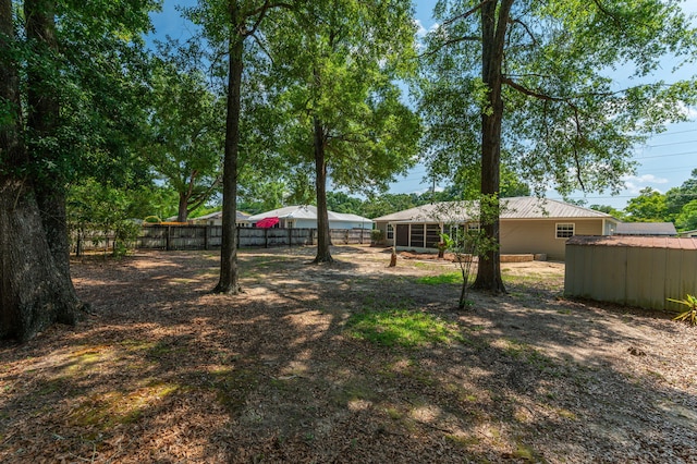 390 Brackin St, Crestview, FL 32539 - view of yard with an outbuilding