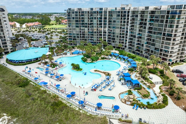 11483 Front Beach Rd Unit 202, Panama City Beach, FL 32407 - drone / aerial view of apartment complex / building and a pool