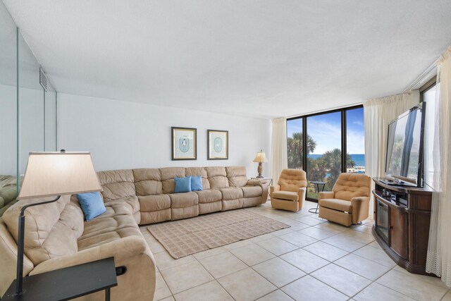 11483 Front Beach Rd Unit 202, Panama City Beach, FL 32407 - living room with light tile patterned floors