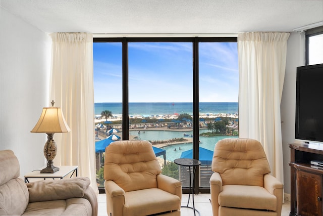 11483 Front Beach Rd Unit 202, Panama City Beach, FL 32407 - living area with a wall of windows
