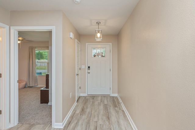 5378 Wyndell Cir, Crestview, FL 32539 - doorway with light wood-type flooring and baseboards