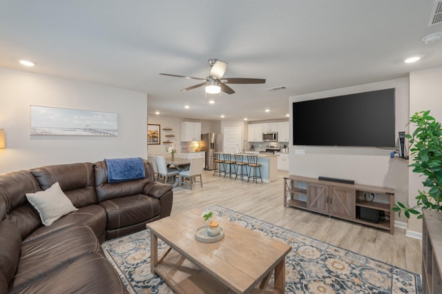 5378 Wyndell Cir, Crestview, FL 32539 - living area featuring a ceiling fan, light wood-type flooring, and recessed lighting
