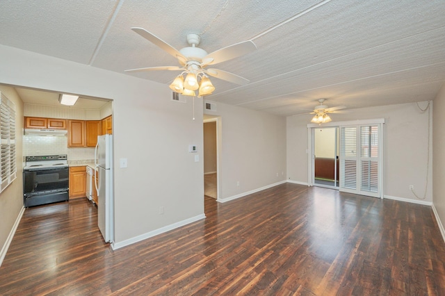 209 W Miracle Strip Pkwy Unit C 202, Mary Esther, FL 32569 - unfurnished living room featuring ceiling fan, dark wood finished floors, baseboards, and a textured ceiling