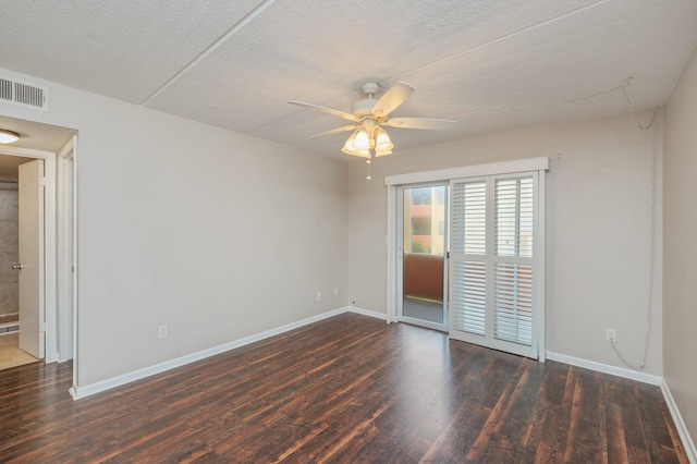 209 W Miracle Strip Pkwy Unit C 202, Mary Esther, FL 32569 - spare room featuring wood finished floors, a ceiling fan, and baseboards