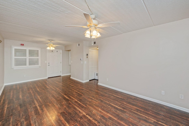 209 W Miracle Strip Pkwy Unit C 202, Mary Esther, FL 32569 - empty room with a ceiling fan, wood finished floors, and baseboards