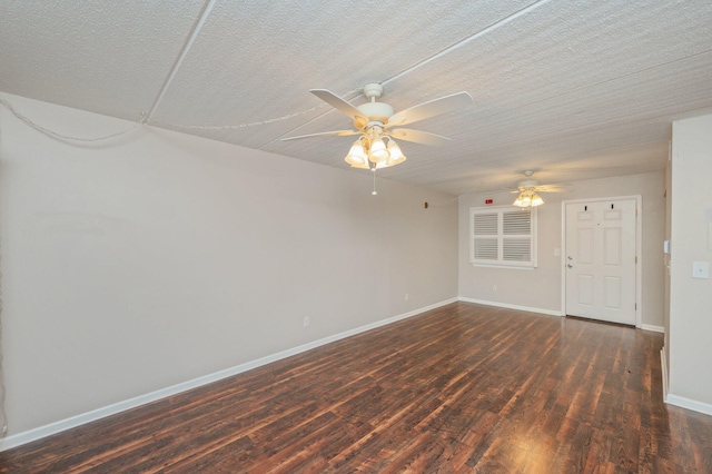 209 W Miracle Strip Pkwy Unit C 202, Mary Esther, FL 32569 - spare room featuring a ceiling fan, wood finished floors, baseboards, and a textured ceiling
