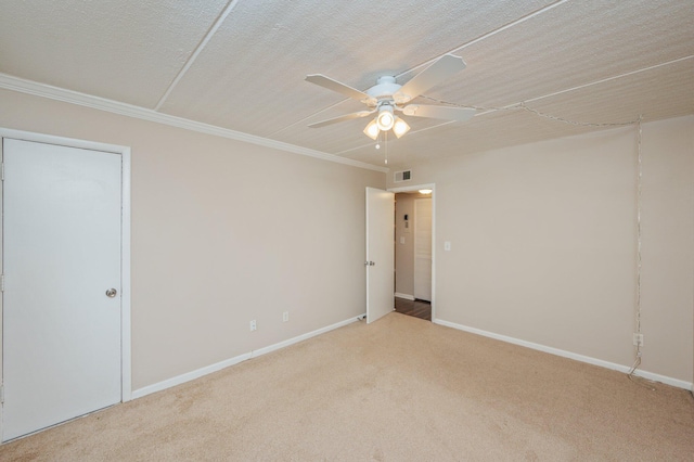209 W Miracle Strip Pkwy Unit C 202, Mary Esther, FL 32569 - spare room with a ceiling fan, carpet floors, baseboards, and ornamental molding