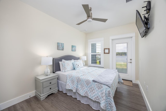 340 Bluefish Dr Unit 106, Fort Walton Beach, FL 32548 - bedroom with baseboards, dark wood-style flooring, and ceiling fan