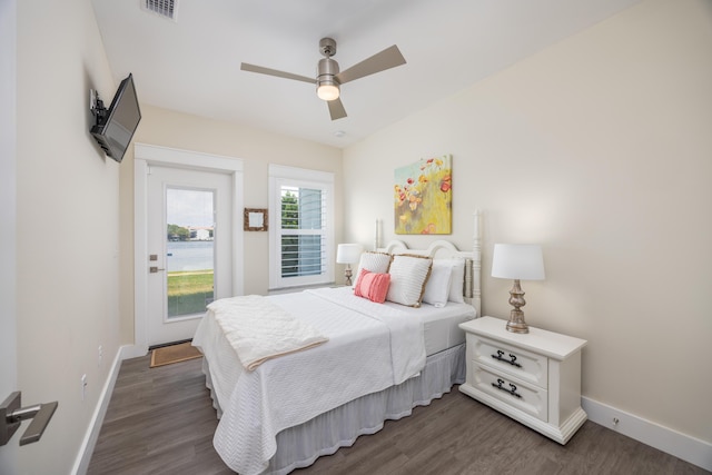 340 Bluefish Dr Unit 106, Fort Walton Beach, FL 32548 - bedroom with dark wood finished floors, baseboards, and a ceiling fan