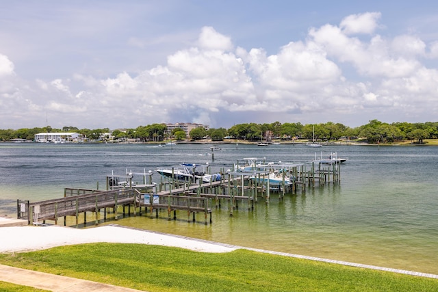 340 Bluefish Dr Unit 106, Fort Walton Beach, FL 32548 - dock area with a water view, boat lift, and a yard