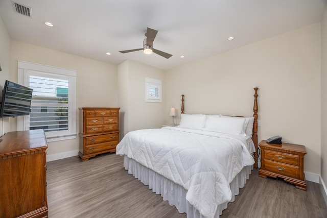 340 Bluefish Dr Unit 106, Fort Walton Beach, FL 32548 - bedroom with wood finished floors, baseboards, ceiling fan, and recessed lighting
