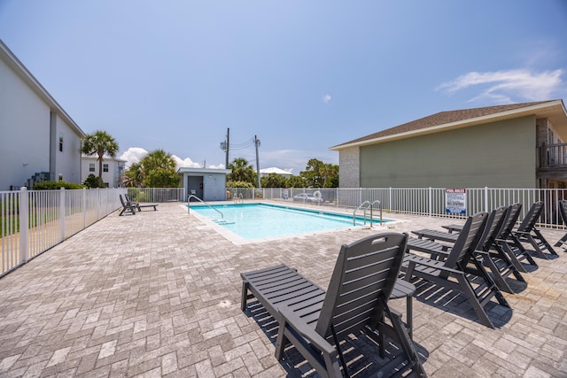 340 Bluefish Dr Unit 106, Fort Walton Beach, FL 32548 - community pool featuring a patio