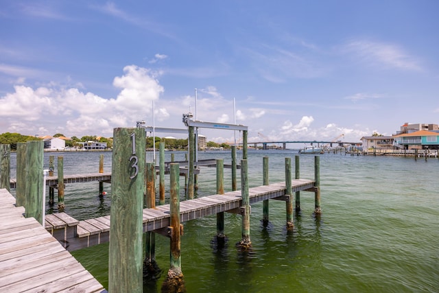 340 Bluefish Dr Unit 106, Fort Walton Beach, FL 32548 - dock with a water view and boat lift