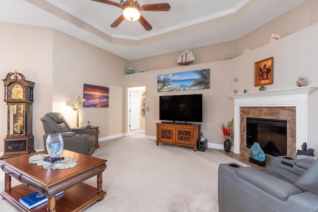 6202 Plum Orchard Way, Crestview, FL 32536 - living area with ceiling fan, light carpet, baseboards, a tile fireplace, and crown molding