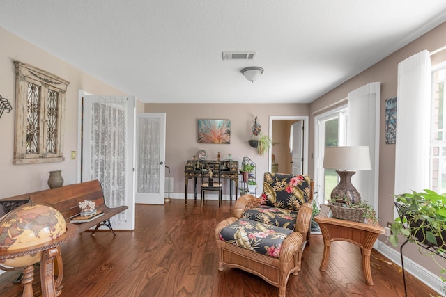 6202 Plum Orchard Way, Crestview, FL 32536 - living area featuring wood finished floors and baseboards