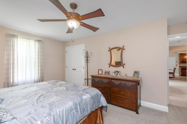 6202 Plum Orchard Way, Crestview, FL 32536 - bedroom featuring light colored carpet, baseboards, a closet, and a ceiling fan