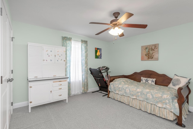 6202 Plum Orchard Way, Crestview, FL 32536 - bedroom with baseboards, light colored carpet, and a ceiling fan