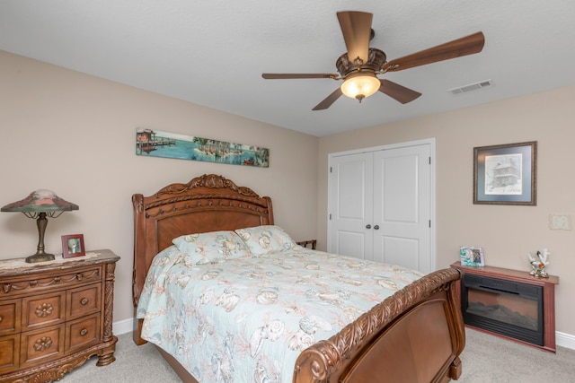 6202 Plum Orchard Way, Crestview, FL 32536 - bedroom featuring light colored carpet, a closet, a ceiling fan, and baseboards