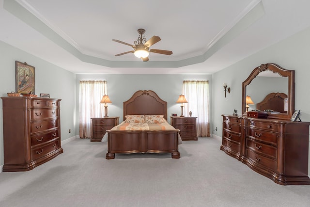6202 Plum Orchard Way, Crestview, FL 32536 - bedroom featuring a tray ceiling, light carpet, a ceiling fan, and ornamental molding