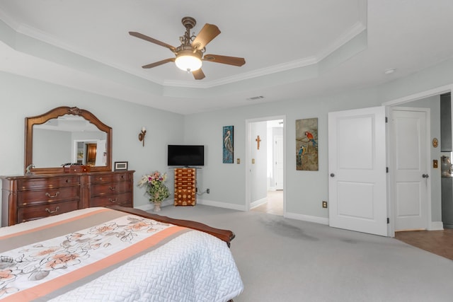 6202 Plum Orchard Way, Crestview, FL 32536 - bedroom with a raised ceiling, ornamental molding, carpet, baseboards, and ceiling fan