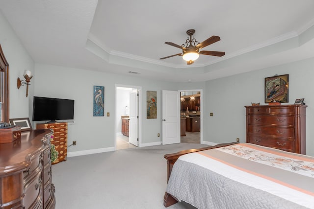 6202 Plum Orchard Way, Crestview, FL 32536 - bedroom with a raised ceiling, crown molding, carpet floors, ensuite bathroom, and baseboards