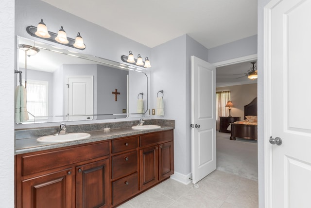 6202 Plum Orchard Way, Crestview, FL 32536 - bathroom with double vanity, tile patterned flooring, a ceiling fan, and ensuite bath