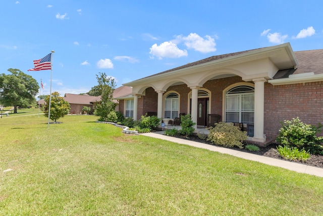 6202 Plum Orchard Way, Crestview, FL 32536 - view of front of property with brick siding, a front lawn, and a porch