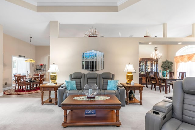 6202 Plum Orchard Way, Crestview, FL 32536 - living area with a chandelier, light carpet, and ornamental molding