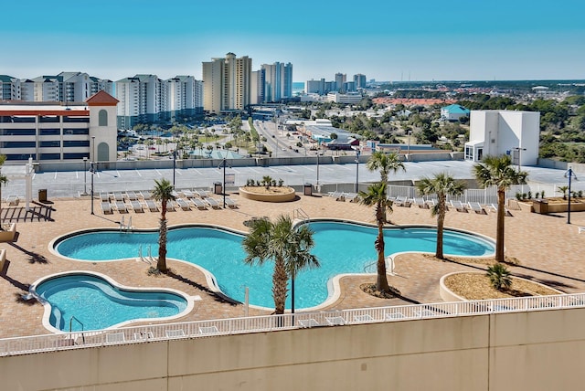 9860 S Thomas Dr Unit 726, Panama City Beach, FL 32408 - community pool with a patio and a view of city