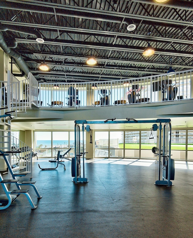 9860 S Thomas Dr Unit 726, Panama City Beach, FL 32408 - workout area featuring plenty of natural light