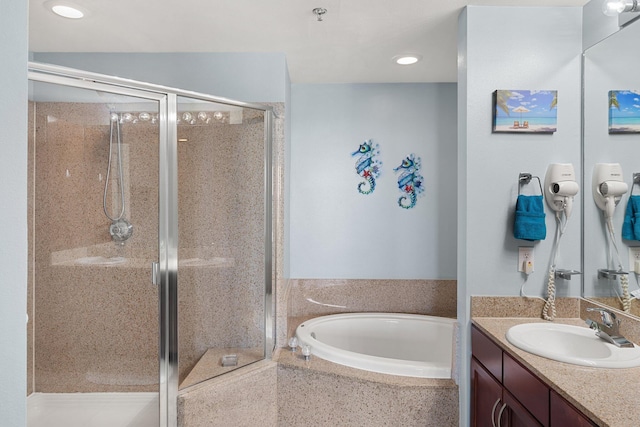 9860 S Thomas Dr Unit 726, Panama City Beach, FL 32408 - full bathroom with vanity, a stall shower, a bath, and recessed lighting
