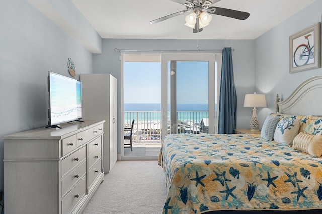 9860 S Thomas Dr Unit 726, Panama City Beach, FL 32408 - bedroom featuring access to exterior, light carpet, and ceiling fan