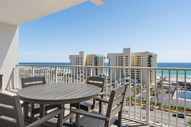 9860 S Thomas Dr Unit 726, Panama City Beach, FL 32408 - balcony with view of water and beach and outdoor dining space
