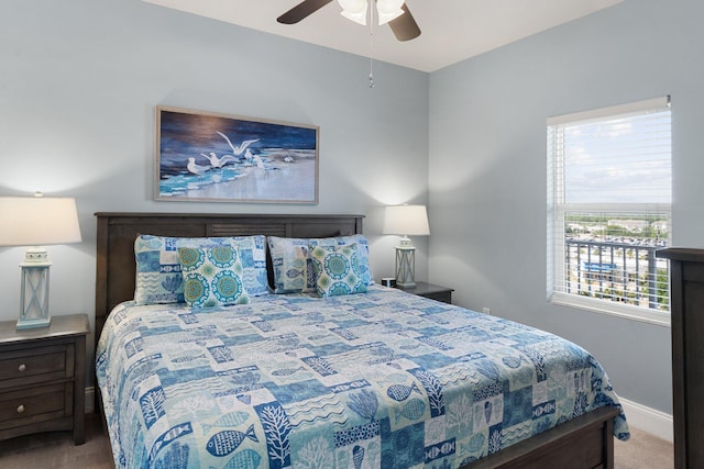 9860 S Thomas Dr Unit 726, Panama City Beach, FL 32408 - carpeted bedroom featuring baseboards and a ceiling fan